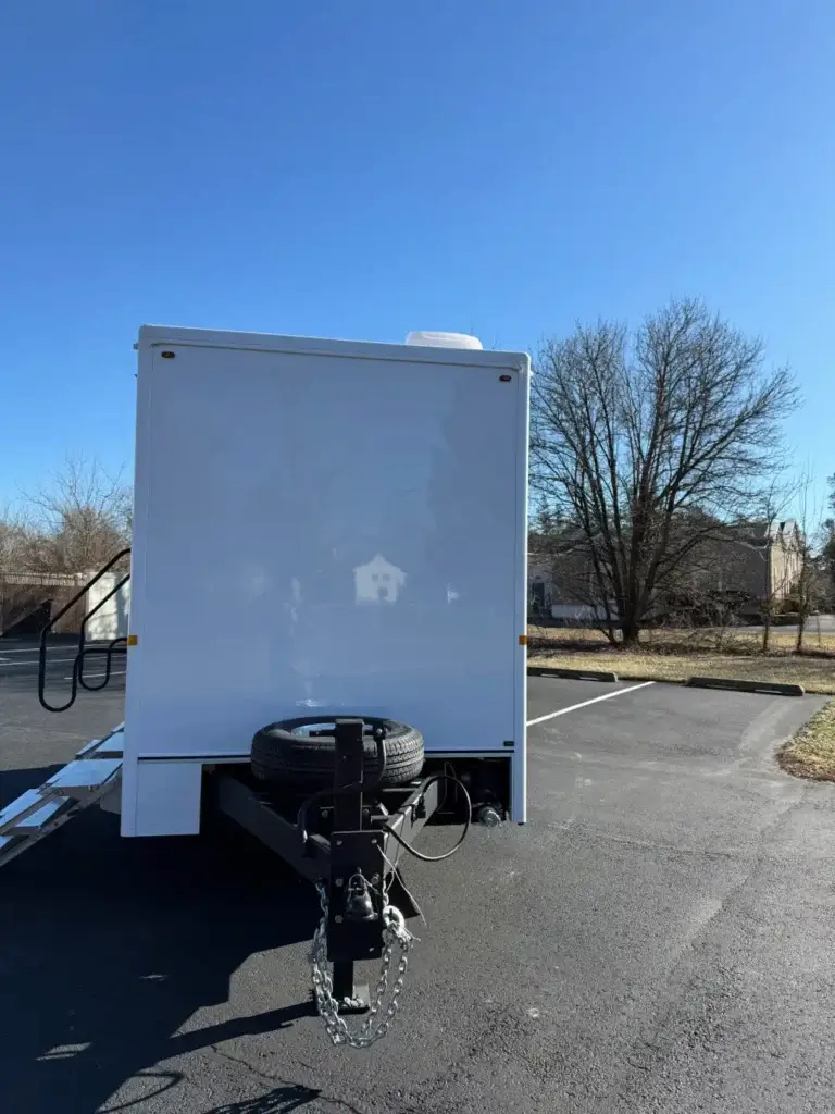 Front View Of A Restroom Trailer